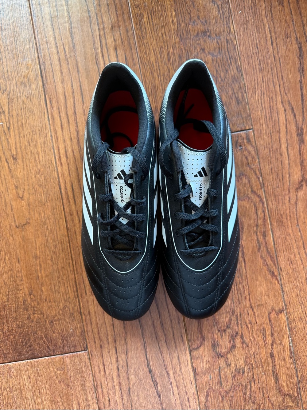 adidas Men’s Black Soccer Shoes with White Stripes and Red Inners
